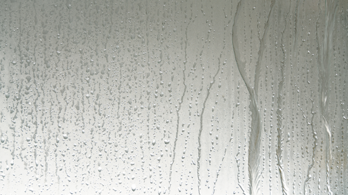 5 Professional Cleaning Tips to Prevent Hard Water Stains on Shower Glass